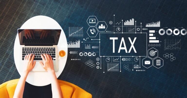 Tax with person using a laptop