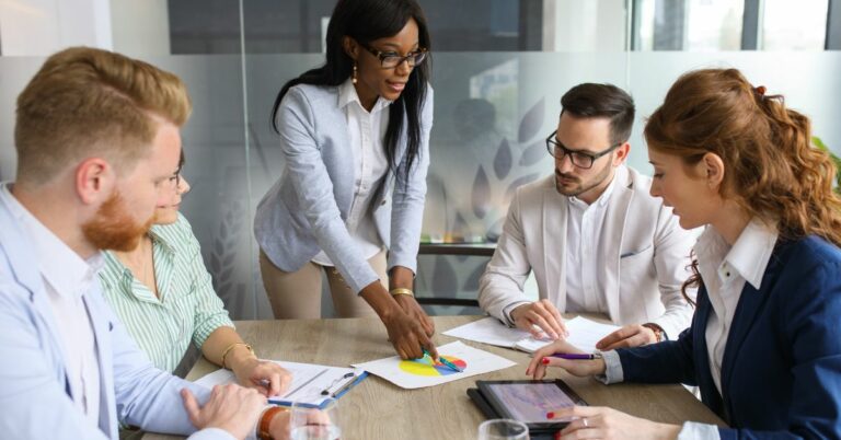 Business people discussing new market and sales analysis